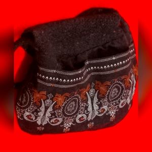 Reversible black wooly shoulder bag